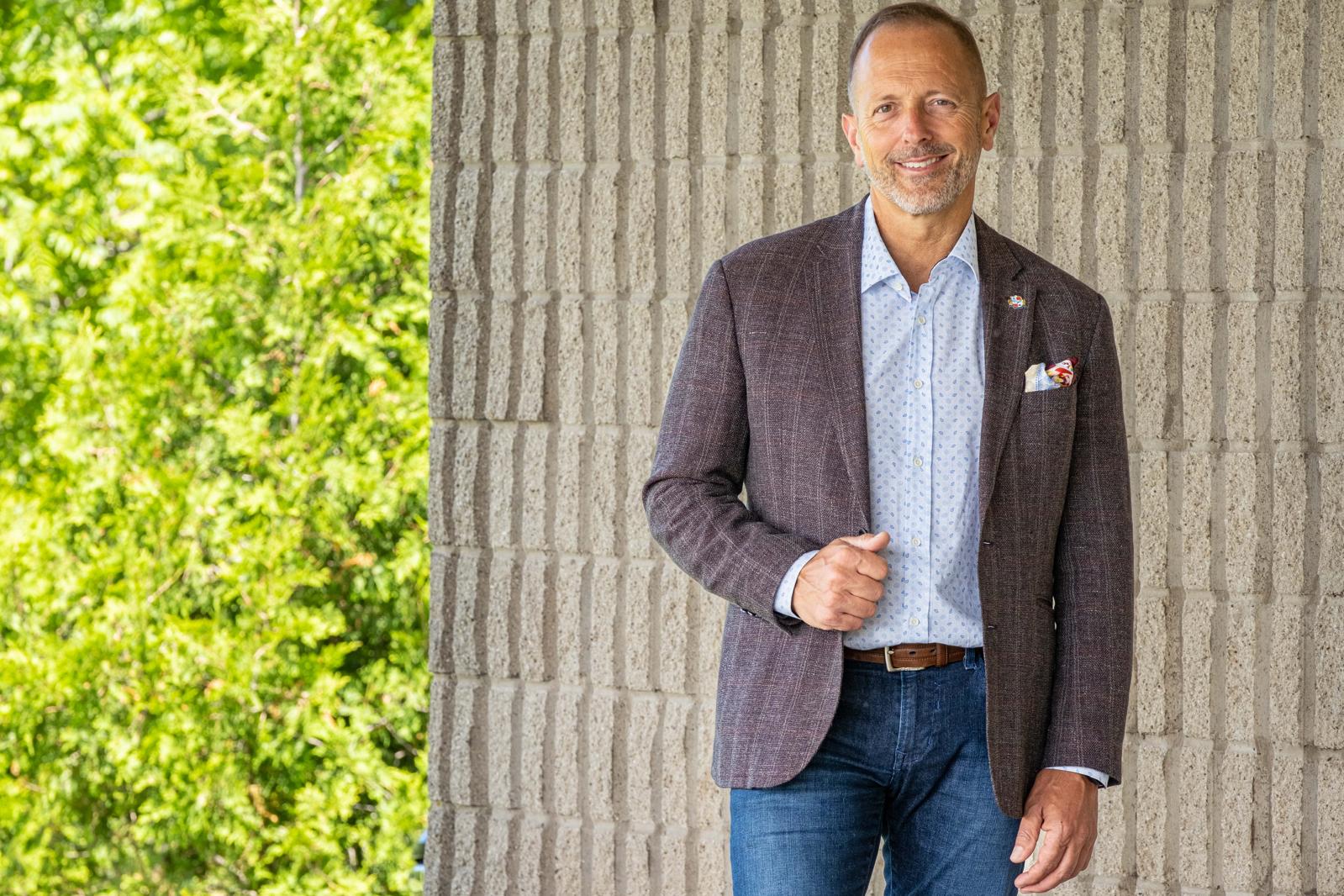 Jim Diodati smiling outdoors in Niagara Falls